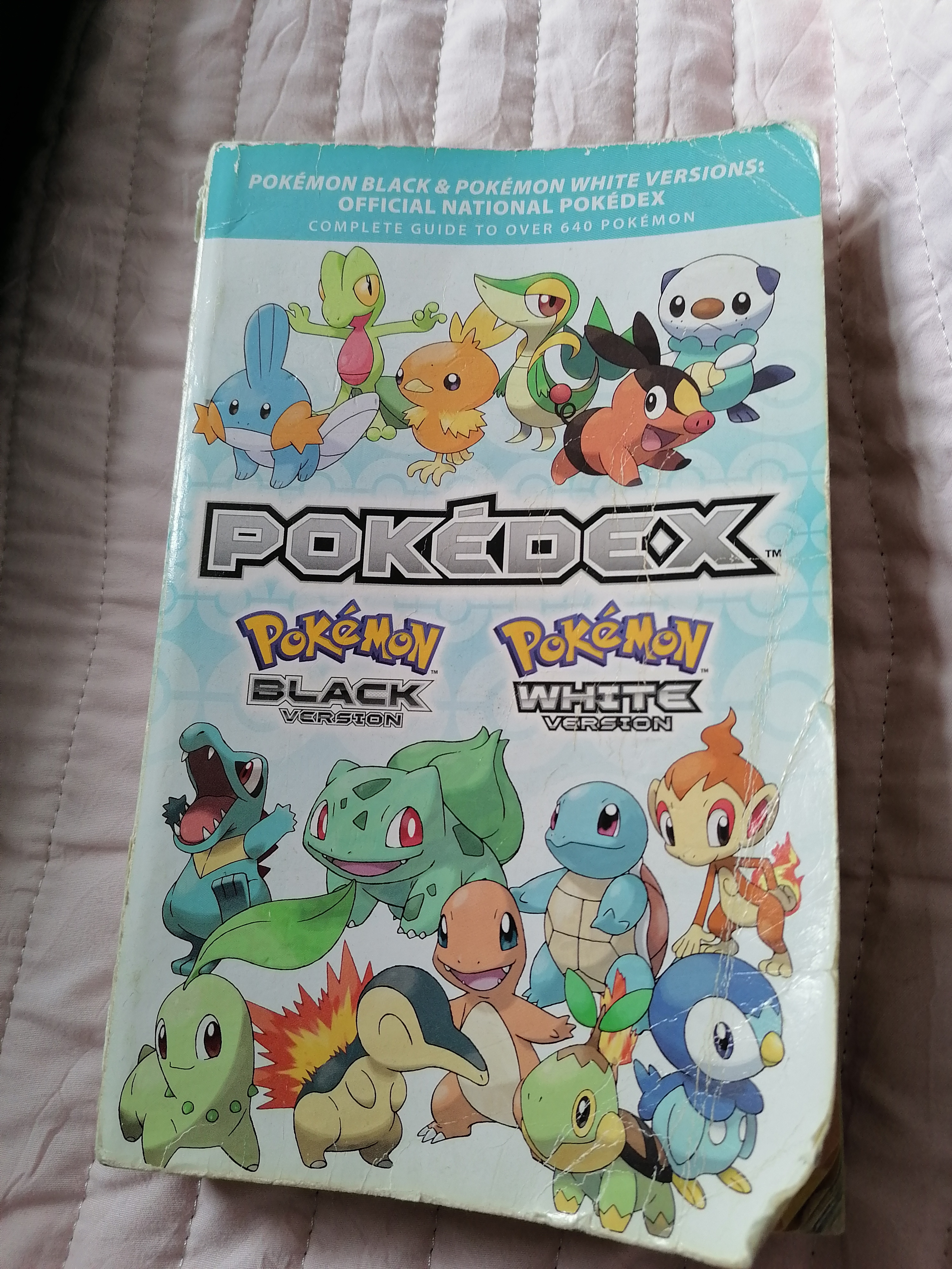 Photograph of black and white national pokedex book front cover
