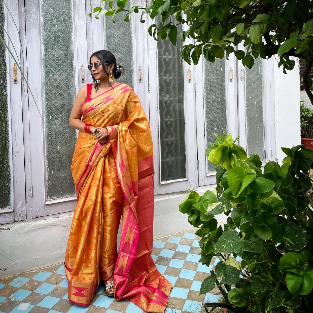 Customer wearing a handwoven pure silk saree from the Katansi collection