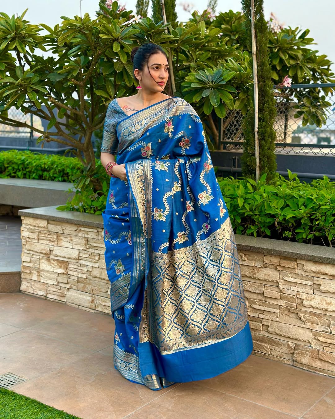 Customer wearing a handwoven pure silk saree from the Katansi collection