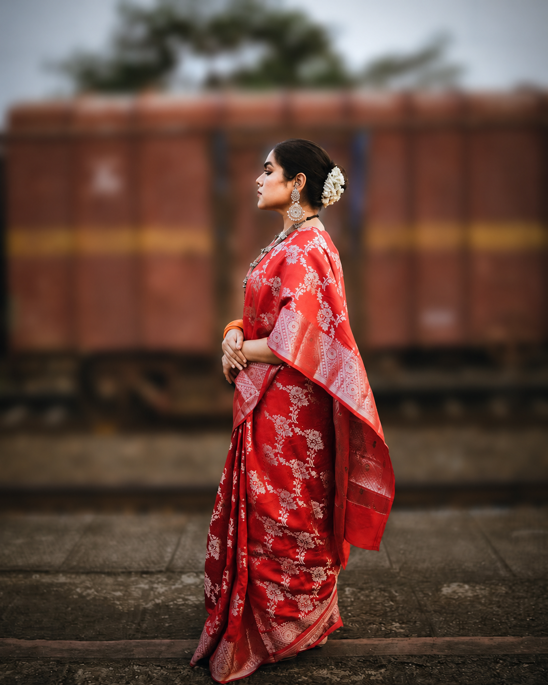 Customer in a Banarasi silk saree handwoven by Katansi master weavers