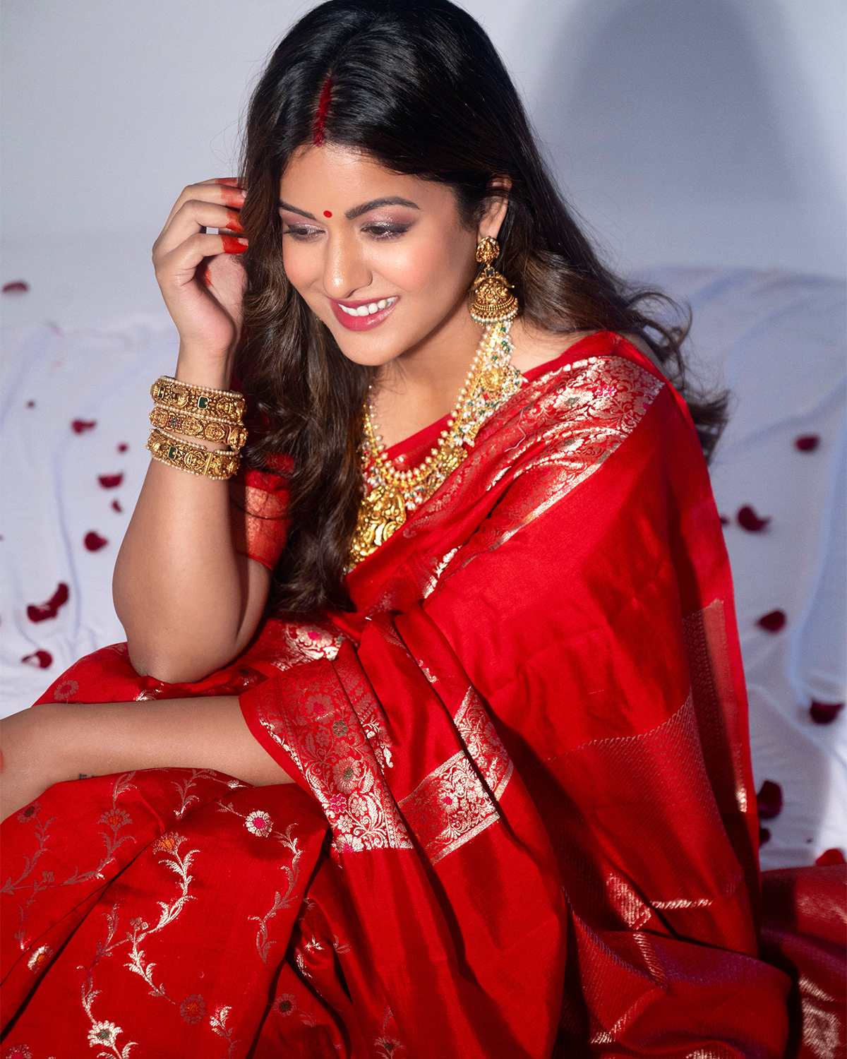 Customer wearing a handwoven pure silk saree from the Katansi collection
